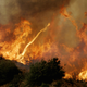 Illustration for article titled Terrifying Images Of Whirling Firenadoes From All Over The World